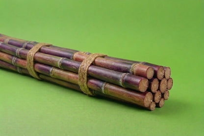 Fresh purple sugar cane bundle tied with twine, exotic produce delivery Toronto and the GTA