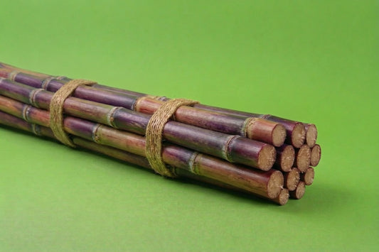 Fresh purple sugar cane bundle tied with twine, exotic produce delivery Toronto and the GTA